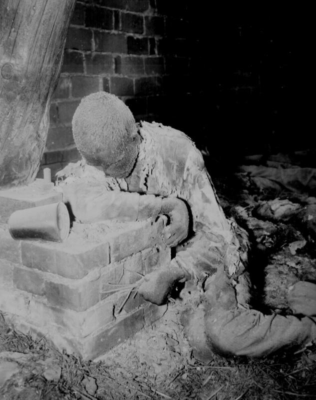 This victim of Nazi inhumanity still rests in the position in which he died