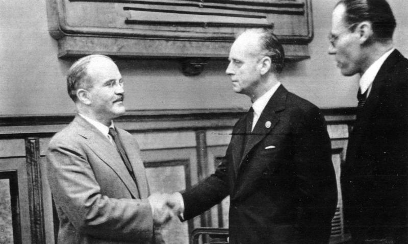 Vyacheslav Molotov and Joachim von Ribbentrop shaking hands