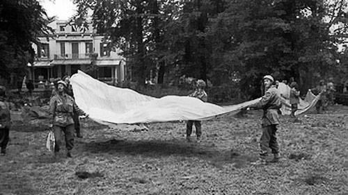 British 1st Airborne soldiers using parachutes to signal to Allied supply aircraft