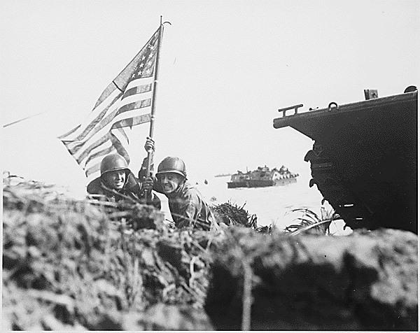 First flag on Guam on boat hook mast